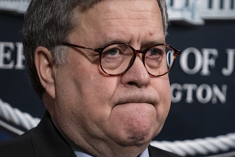 FILE - In this Jan. 13, 2020, file photo Attorney General William Barr speaks to reporters at the Justice Department in Washington. (AP Photo/J. Scott Applewhite, File)