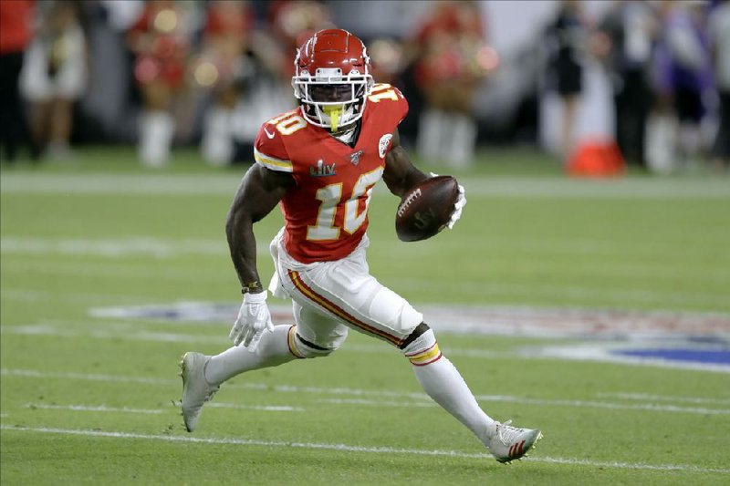 Kansas City Chiefs wide receiver Tyreek Hill delivered box lunches to nurses at St. Luke’s Hospital in Kansas City, Mo., last week. Hill, whose mother is a nurse, said he wanted to nd a way to give back during the coronavirus pandemic. (AP/Chris O’Meara) 
