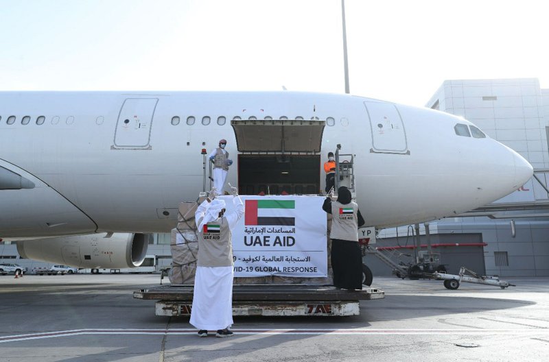 In this Tuesday, May 19, 2020 photo released by the state-run WAM news agency, an Etihad Airways flights loaded with aid for the Palestinians to fight the coronavirus pandemic is loaded in Abu Dhabi, United Arab Emirates. Etihad Airways flew aid for the Palestinians amid the coronavirus pandemic from the capital of the United Arab Emirates into Israel on Tuesday, marking the first known direct commercial flight between the two nations. (WAM via AP) story.lead_photo.caption