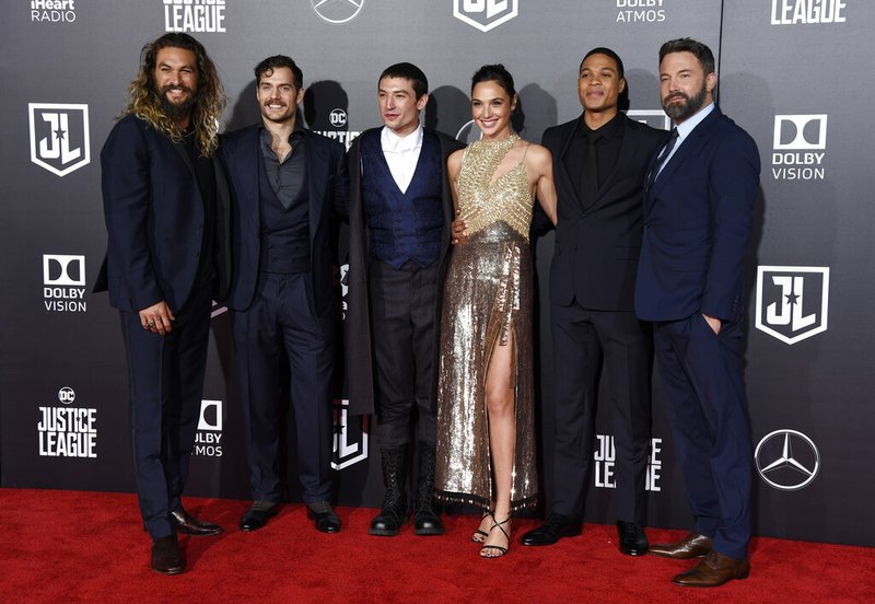 The cast of "Justice League" poses at the premiere of the film in Los Angeles in 2017. From left are Jason Momoa, Henry Cavill, Ezra Miller, Gal Gadot, Ray Fisher and Ben Affleck. Warner Bros. Pictures said Wednesday, May 20, 2020, that director Zack Snyder’s cut of the film will debut next year on the streaming service HBO Max.