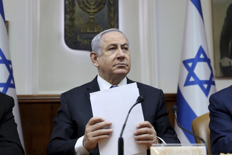 FILE - In this Feb. 16, 2020, file, photo, Israeli Prime Minister Benjamin Netanyahu chairs the weekly cabinet meeting, in Jerusalem. (Gali Tibbon/Pool via AP, File)