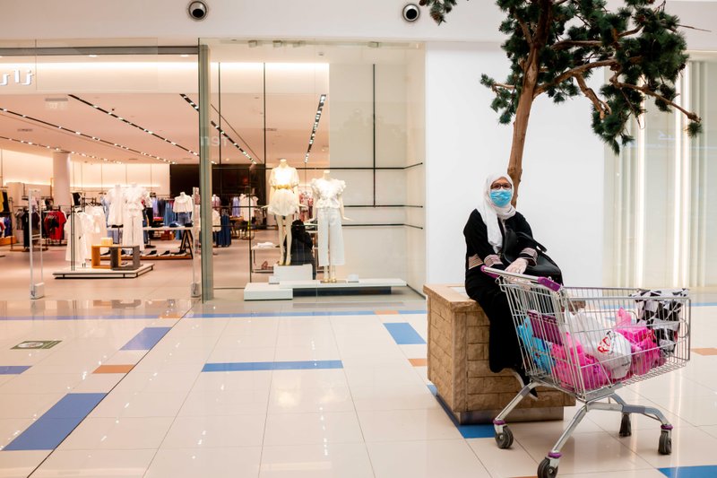A woman waits for a friend in a mall in Riyadh, Saudi Arabia on May 12, 2020.
(For The Washington Post by Tasneem Alsultan)
