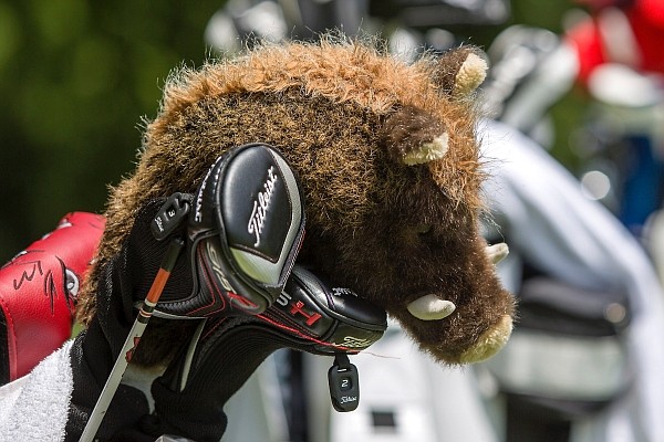 A Razorback head cover sits in a golf bag at Pinnacle Country Club in Rogers during practice rounds for the Walmart NWA Arkansas Championship.