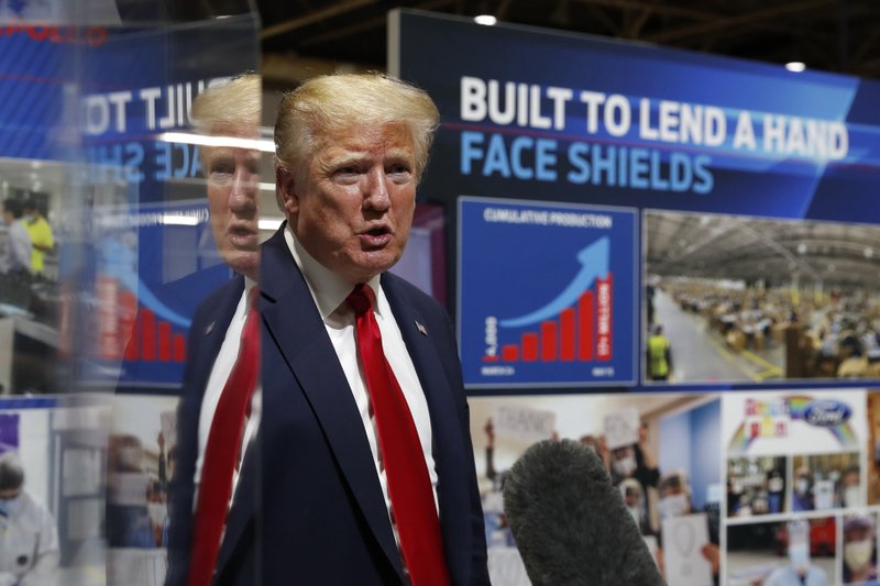 President Donald Trump speaks as he tours Ford's Rawsonville Components Plant that has been converted to making personal protection and medical equipment, Thursday, May 21, 2020, in Ypsilanti, Mich. (AP Photo/Alex Brandon)