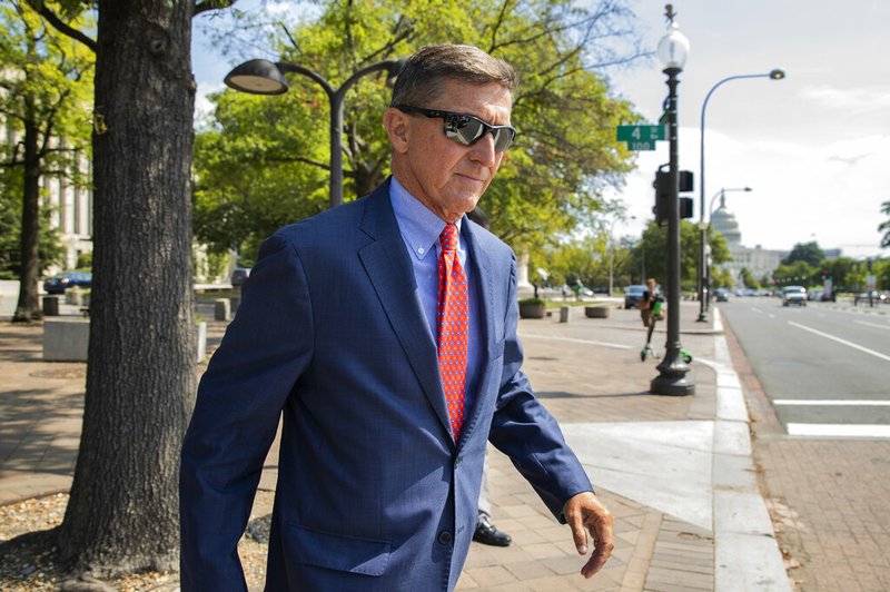 In this Sept. 10, 2019 file photo, Michael Flynn, President Donald Trump's former national security adviser, leaves the federal court following a status conference in Washington. FBI Director Christopher Wray has ordered an internal review into possible misconduct in the investigation of former Trump administration national security adviser Michael Flynn. That's according to an FBI statement issued Friday. (AP Photo/Manuel Balce Ceneta) story.lead_photo.caption