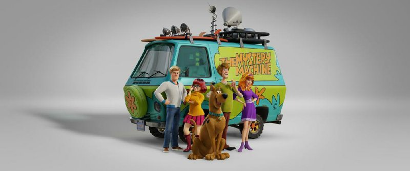 The Mystery Machine and its denizens (from left) Fred (voice of Zac Efron), Velma (Gina Rodriguez), Scooby-Doo (Frank Welker), Shaggy (Will Forte), and Daphne (Amanda Seyfried) are back as another iteration of those darn mystery-solving kids in Scoob!