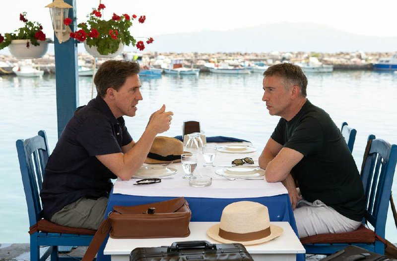 Rob Brydon (left) and Steve Coogan play stylized versions of themselves in Michael Winterbottom’s The Trip to Greece, the fourth (and presumably last) in a series of films that had them gallivanting all over the continent in search of great food and stimulating conversation.
