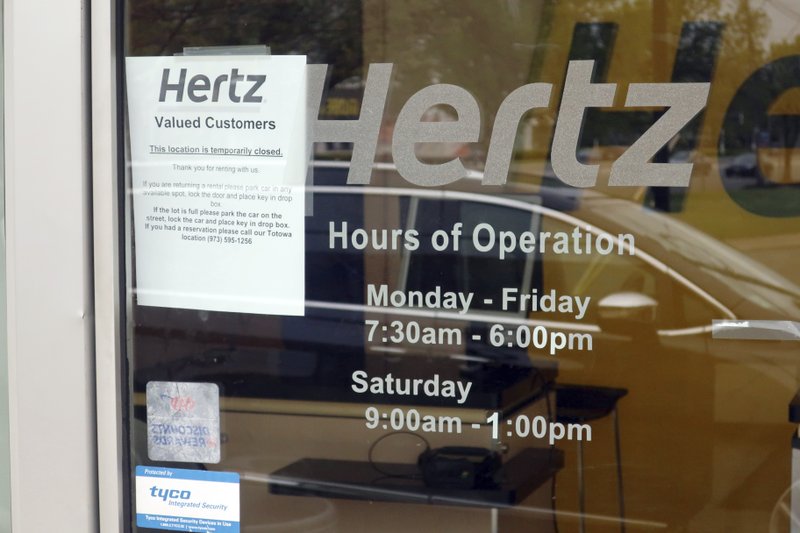 A Hertz Car Rental is closed during he coronavirus pandemic on Wednesday, May 6, 2020 in Paramus, N.J. (AP Photo/Ted Shaffrey)