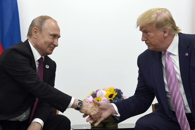 In this June 28, 2019, file photo, President Donald Trump and Russian President Vladimir Putin meet at the G20 summit in Osaka, Japan. (AP Photo/Susan Walsh, File)