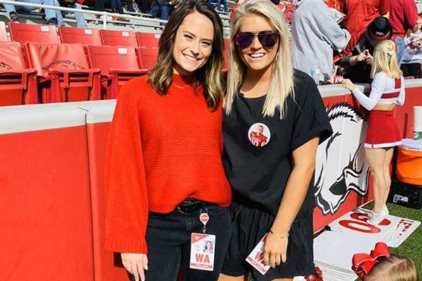 Callie Conway (left) and Maddie Pool are shown prior to a home Arkansas football game. 