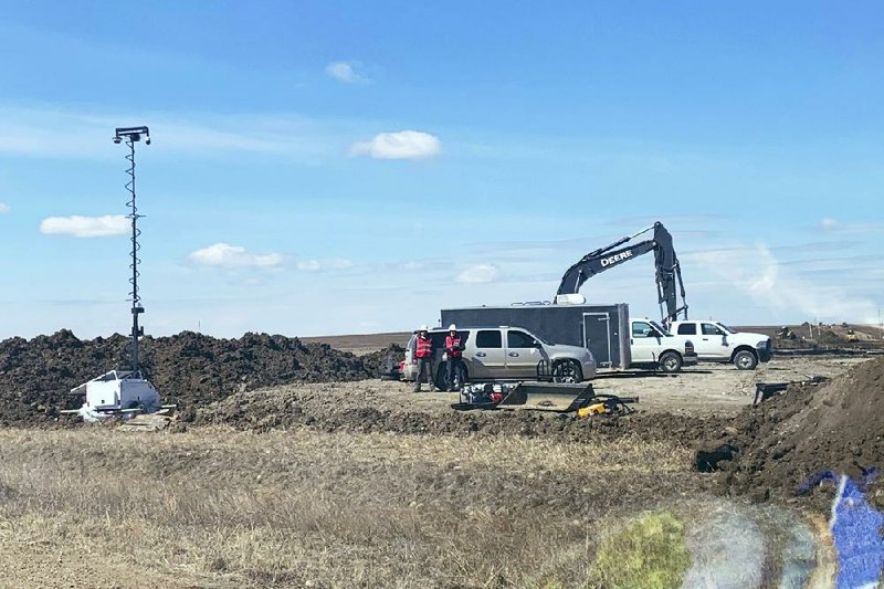 Work was underway earlier this month on a section of the Keystone XL pipeline that crosses into the U.S. from Canada near Saco, Mont.
(AP/Angeline Cheek)