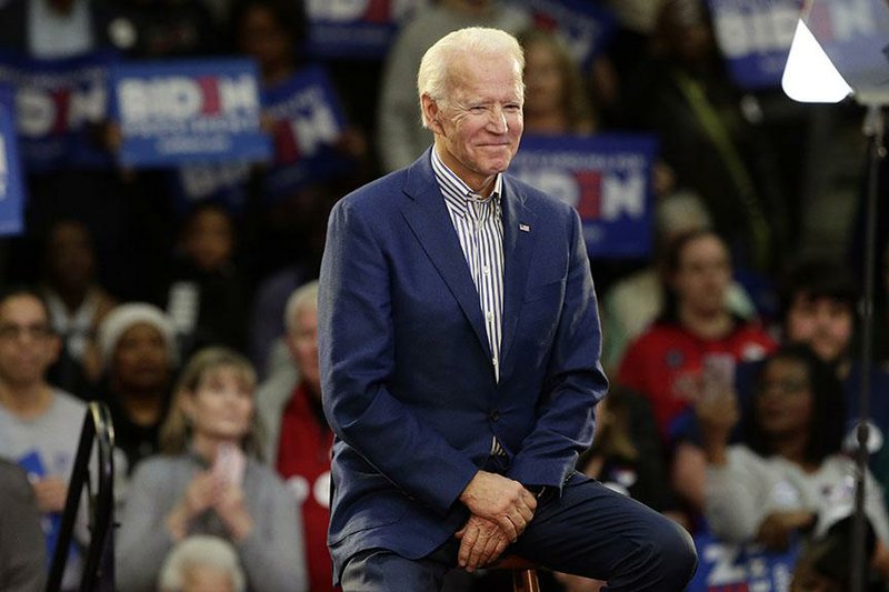 Democratic presidential candidate former Vice President Joe Biden smiles at supporters during a campaign event at Saint Augustine's University in Raleigh, N.C., Saturday, Feb. 29, 2020. (AP Photo/Gerry Broome)