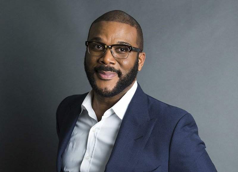 In this Nov. 16, 2017, file photo, actor-filmmaker and author Tyler Perry poses for a portrait in New York. Perry is looking to reopen his 330-acre Atlanta-based mega studio soon, but other studios in Georgia are anxiously waiting for Hollywood's green light to return back to work. Perry plans on restarting production at the Tyler Perry Studios complex in July, making it one of the first studios to domestically reopen after production was halted a few months ago to combat the spread of the coronavirus. (Photo by Amy Sussman/Invision/AP, File)
