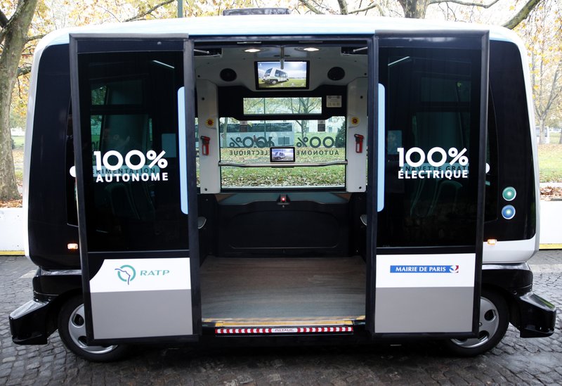 EasyMile's electric driverless shuttle, shown in Paris, can carry 12-15 passengers. (AP/Christophe Ena)