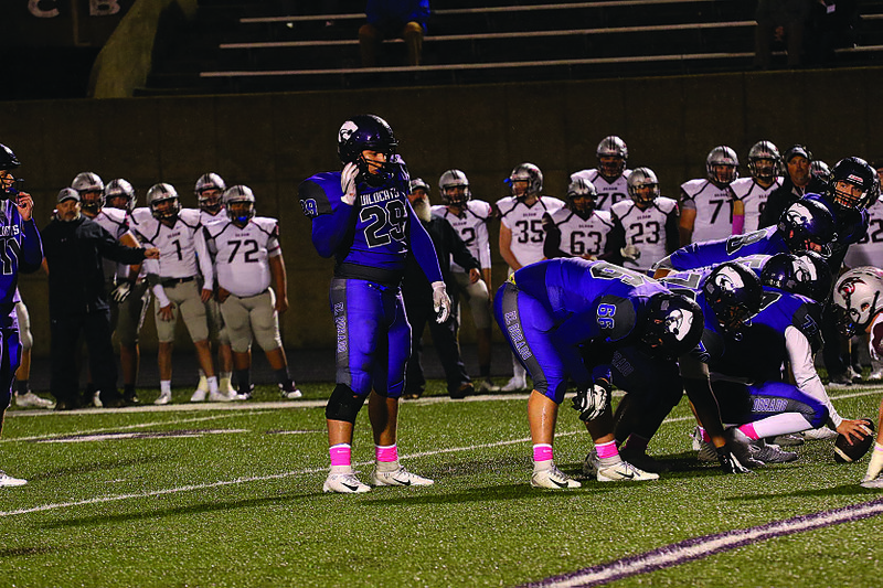 El Dorado's Patrick Sixbey (29) surveys the defense before the ball is snapped in action last season at Memorial Stadium. After playing fullback as a sophomore, Sixbey will move to the defensive side of the ball next season.