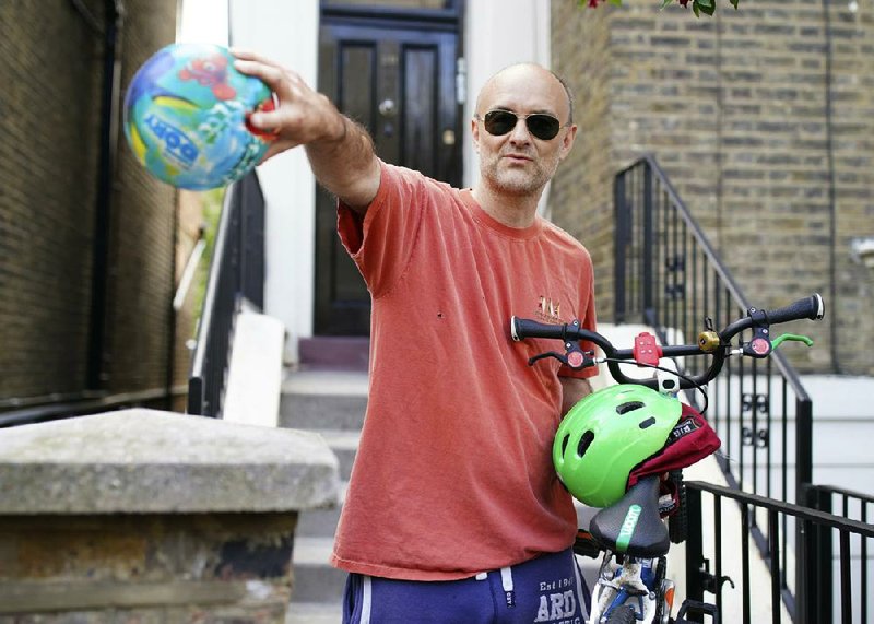 Dominic Cummings, a senior government adviser, is seen Saturday outside his London home.
(AP/Aaron Chown)