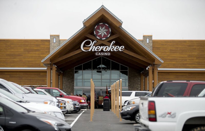 Vehicles line the parking lot in 2017 during the grand opening of a new Cherokee Casino in Grove, Okla. (File Photo/NWA Democrat-Gazette)