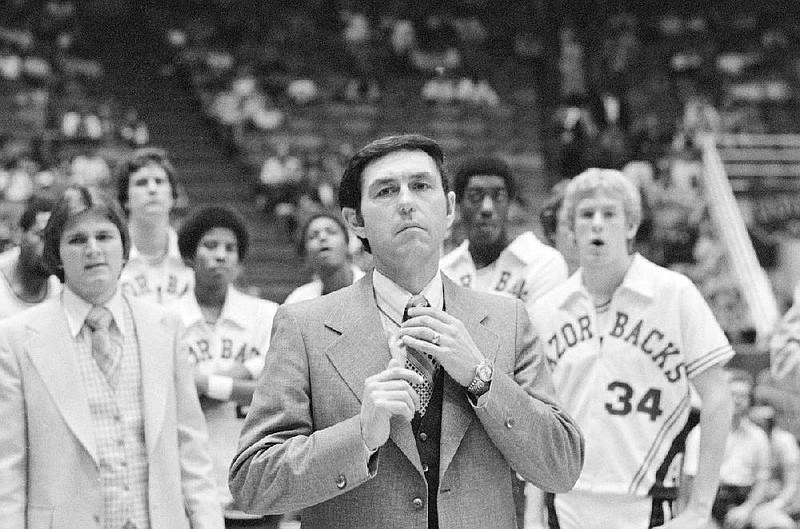 University of Arkansas head basketball coach Eddie Sutton watches as his Razorbacks are introduced prior to their Southwest Conference Playoff game with SMU in Houston, Texas, March 2, 1978. Sutton has been named the Associated Press Coach of the Year. (AP Photo)