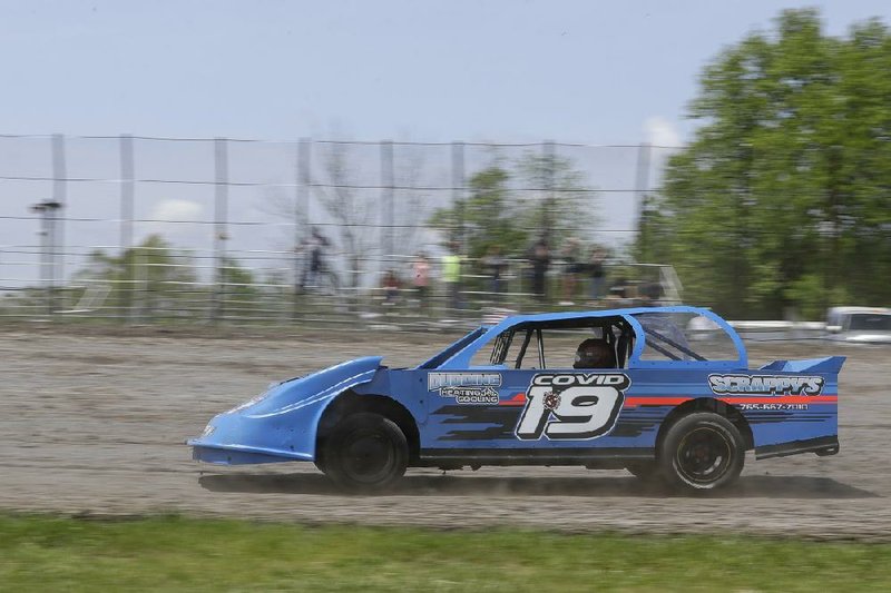 Gabe Wilkins drives his car during a practice session at Gas City I-69 Speedway on Sunday in Gas City, Ind. Short tracks have been trying to fill a void as the sports word has been shut down with the coronavirus pandemic even if their races are run in front of empty venues or limited attendance. (AP/Darron Cummings) 