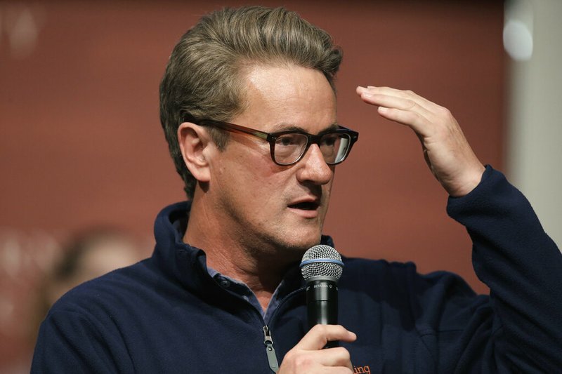In this Oct. 11, 2017, file photo, MSNBC television anchor Joe Scarborough takes questions from an audience at forum at the John F. Kennedy School of Government, on the campus of Harvard University, in Cambridge, Mass. The husband of a woman who died accidentally in an office of then-GOP Rep. Joe Scarborough two decades ago is demanding that Twitter remove President Donald Trump’s tweets suggesting Scarborough murdered her. (AP Photo/Steven Senne, File)