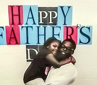 Derick Coley, shown here with his 8-year-old daughter Adaisyah, died May 2 after testing positive for covid-19 while serving a 20-year sentence at the Arkansas Department of Corrections’ Cummins Unit. 
(Special to the Democrat-Gazette) 