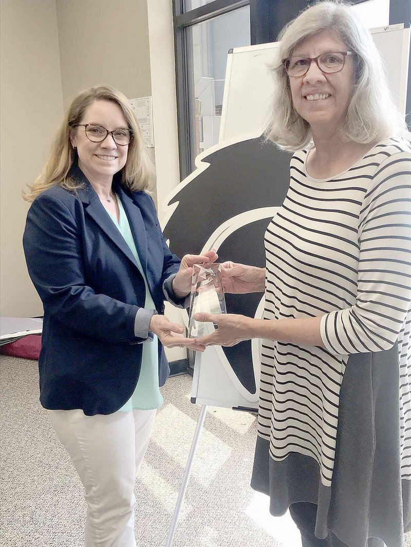 COURTESY PHOTO Dona Gregory, Lincoln High's Virtual Arkansas facilitator, right, is the 2020 Virtual Arkansas Facilitator of the Year. Gregory is the first one to receive the award. She is holding her award with Courtney Jones, principal of Lincoln High.