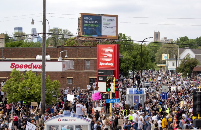 People gather Tuesday in Minneapolis for a protest over the death of George Floyd.
(AP/Star Tribune/Carlos Gonzalez)