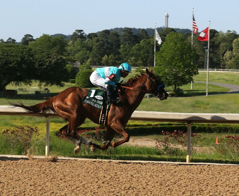 Charlatan, which won the first division of the Arkansas Derby on May 2 at Oaklawn and is trained by Bob Baffert, tested positive in Arkansas for a banned substance. (Arkansas Democrat-Gazette/Thomas Metthe) 
