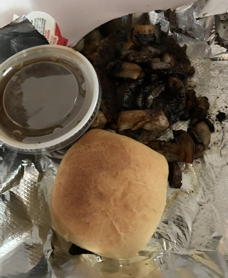 Hamburger steak with fresh mushrooms and a mushroom gravy was a recent lunch special at Alley Oops.
(Arkansas Democrat-Gazette/Eric E. Harrison)

