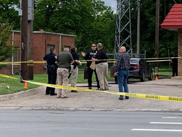 Police investigate a shooting Thursday at East Broadway Street and Lynch Drive in North Little Rock. 