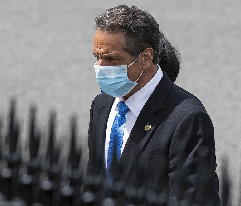 New York Gov. Andrew Cuomo walks towards the West Wing as he arrives at the White House for a meeting with President Donald Trump, Wednesday, May 27, 2020, in Washington. (AP Photo/Manuel Balce Ceneta)