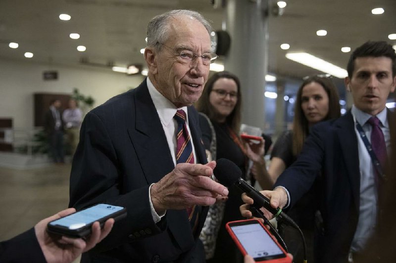 Sen. Charles Grassley, R-Iowa, speaks to the media after leaving the Senate chamber, on Capitol Hill in Washington, Monday, Feb. 3, 2020. (AP Photo/Jacquelyn Martin)