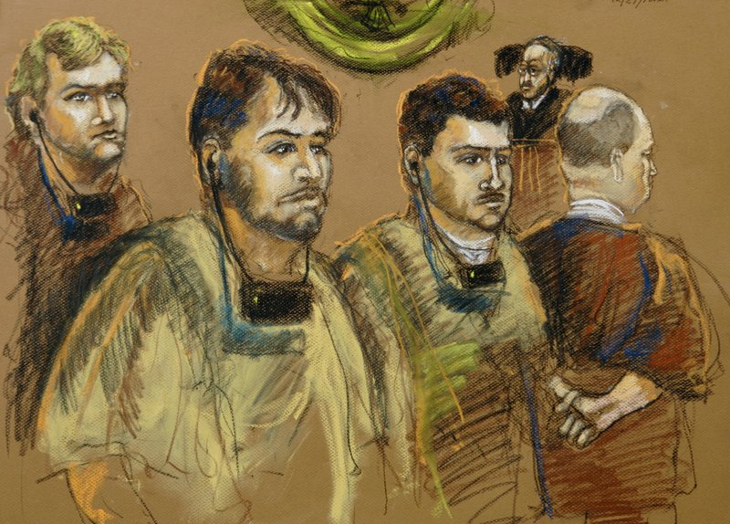 FILE - In this Dec. 17, 2007 file artist's rendering four South American men appear before U.S. Magistrate William C. Turnoff, right rear, on accusations they acted as illegal Venezuelan agents in an attempt to cover up the true source of a suitcase full of cash intended for the campaign of Argentina's new president Cristina Fernandez in Miami. From left to right are: Moises Maionica of Venezuela, Franklin Duran of Venezuela, Carlos Kauffman of Venezuela and Rodolfo Wanseele of Uruguay. (AP Photo/Shirley Henderson, File)