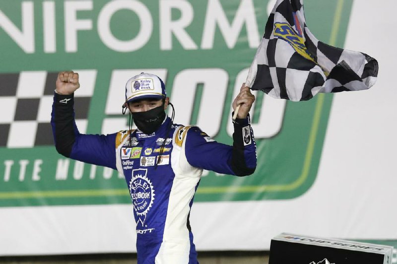 Chase Elliott celebrates after winning Thursday’s NASCAR Cup Series race at Charlotte Motor Speedway in Concord, N.C. It was the first victory of the season for Elliott, who has had two frustrating losses since racing resumed May 17.
(AP/Gerry Broome)