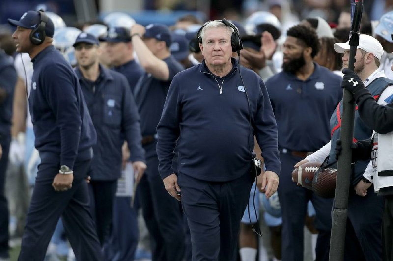 North Carolina football Coach Mack Brown said the school will encourage its players “to stay in their bubble” once they are tested for covid-19 after their return to campus. The NCAA released guidelines Friday on bringing athletes back to campus, which do not recommend testing all athletes upon arrival.
(AP/Julio Cortez)