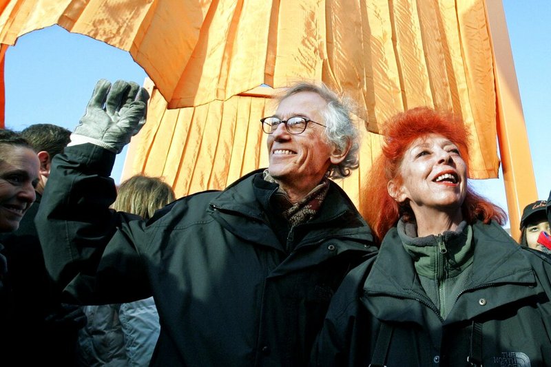 Artists Christo (left) and Jeanne-Claude, his wife and partner, participate in opening "The Gates" project in New York's Central Park in Feb. 12, 2005, file photo. Christo, known for his large, ephemeral public arts projects, died. Sunday, May 31, 2020, at age 84. Jeanne-Claude died Nov. 18, 2009 at age 74.