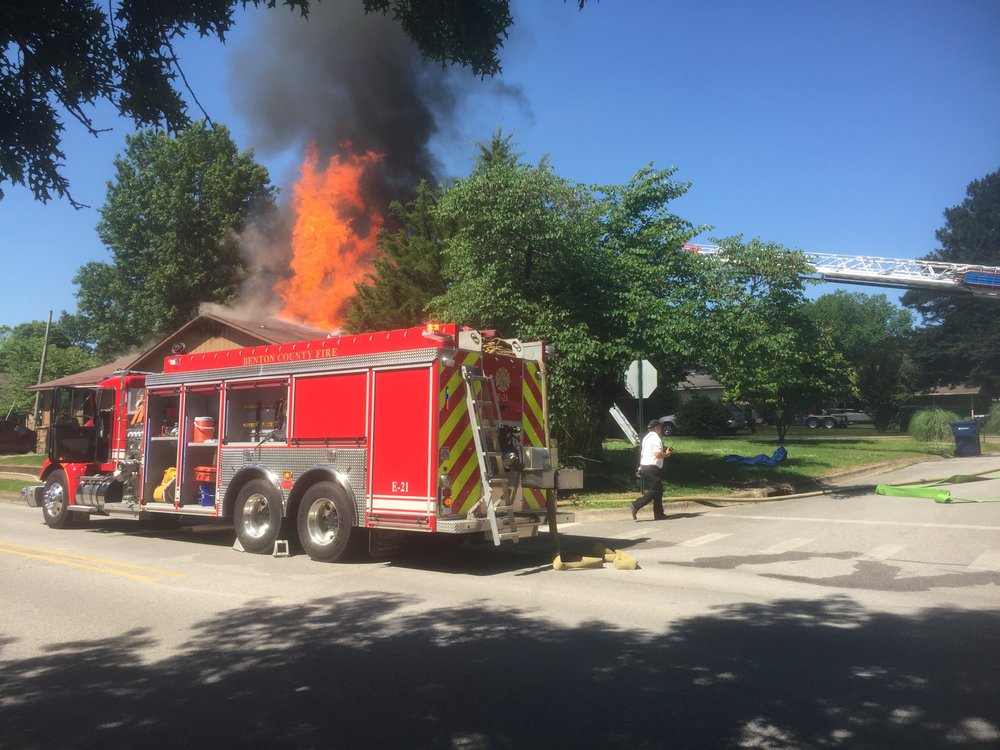 Firefighters battle house fire in Siloam Springs