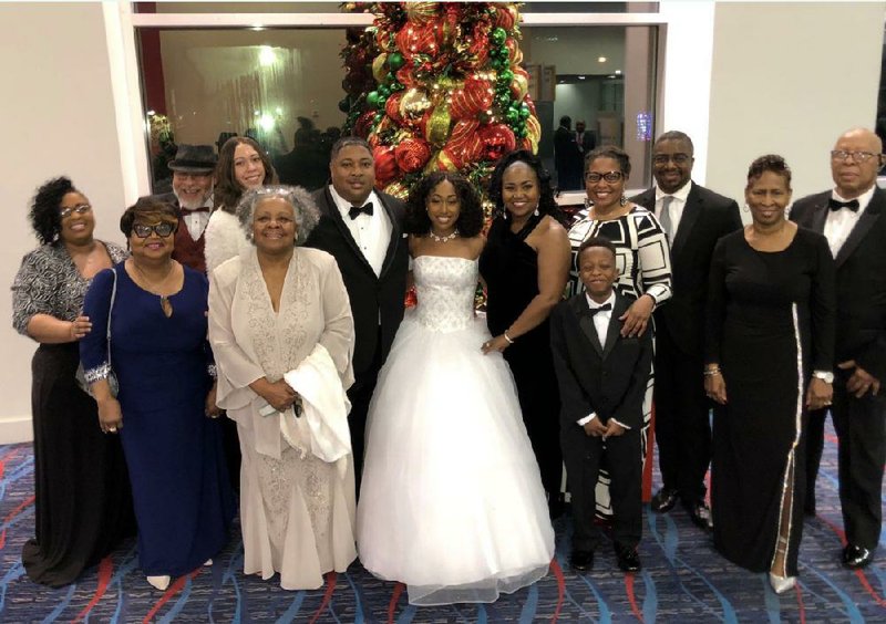 From left to right:
Chasserious Peterson
Margaret Dillard
Ronald Woolfolk
Azriel Woolfolk
Marilyn Rutledge
Michael Woolfolk / Father
Camryn M. Woolfolk / Graduate, Parkview Arts & Science Magnet
Kenitra D. Woolfolk / Mother
Xavier Rutledge
Dr. Estelle Rutledge
Lowell Dillard Jr.
Irma J. Woolfolk
Paul Woolfolk