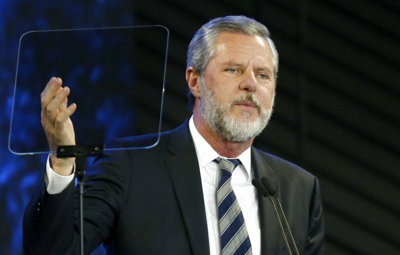 FILE - In this Nov. 28, 2018, file photo, Liberty University President Jerry Falwell Jr. speaks before a convocation at Liberty University in Lynchburg, Va. Nearly three dozen black alumni of Liberty University are denouncing school President Jerry Falwell Jr. on Monday, June 1, 2020, suggesting he step down after he mocked Virginia's mask-wearing requirement by invoking the blackface scandal that engulfed the state's governor last year. (AP Photo/Steve Helber, File)