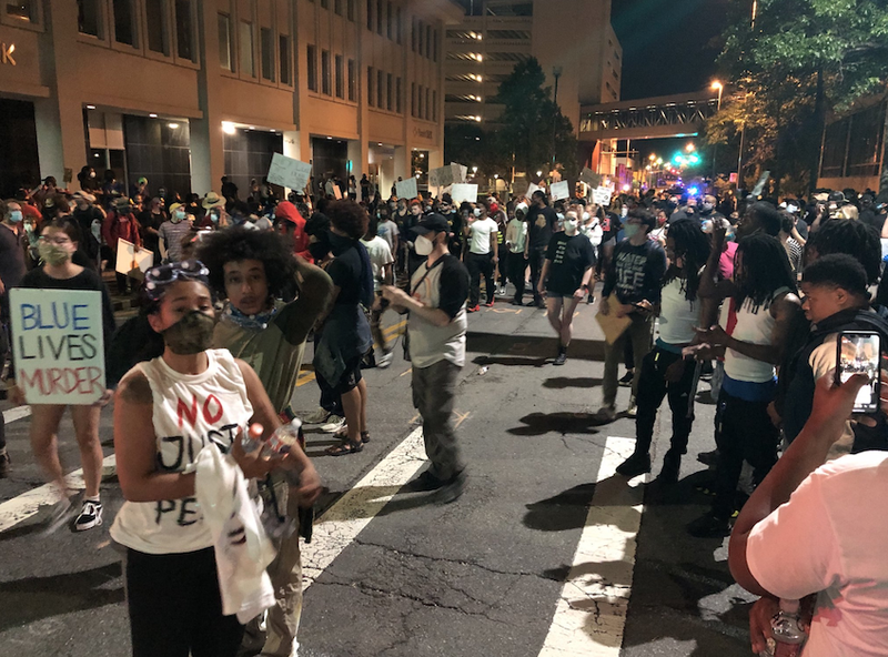 Protesters demonstrate in downtown Little Rock Monday night.