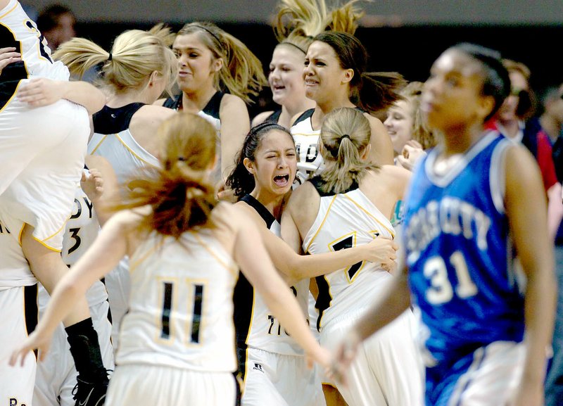 Arkansas Democrat-Gazette/KAREN E. SEGRAVE Star City's Jerrica Scott (31, in blue in foreground) leaves the court as Prairie Grove's bench erupts with celebration in their 59-56 victory in the class 4A girls state championship held Thursday, March 11, 2010 at the Summit Arena in Hot Springs. Prairie Grove beat Malvern, 58-40, in the quarterfinals to reach the championship game. story.lead_photo.caption