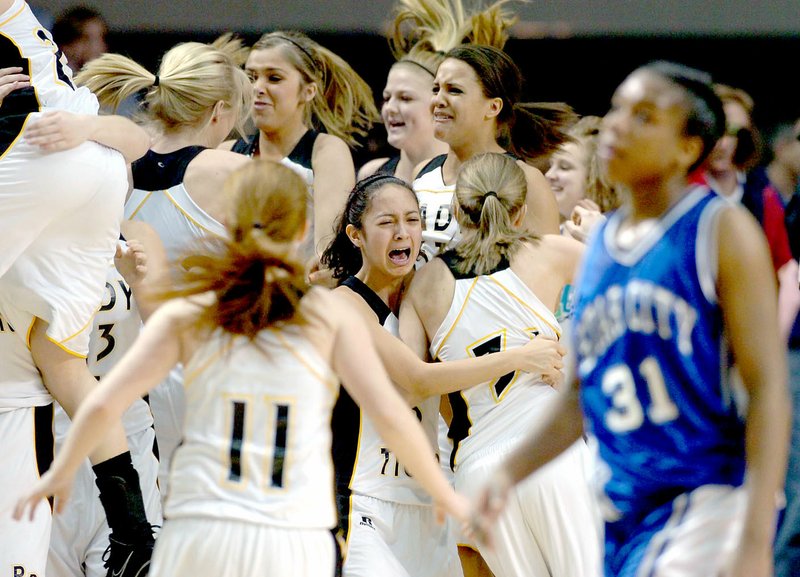 Arkansas Democrat-Gazette/KAREN E. SEGRAVE Star City's Jerrica Scott (31, in blue in foreground) leaves the court as Prairie Grove's bench erupts with celebration in their 59-56 victory in the class 4A girls state championship held Thursday, March 11, 2010 at the Summit Arena in Hot Springs. Prairie Grove beat Malvern, 58-40, in the quarterfinals to reach the championship game.