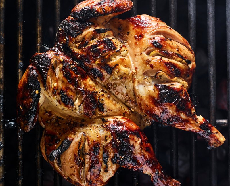 Grilled Spatchcocked Chicken With Honey, Chile and Lemon (The New York Times/Andrew Purcell)