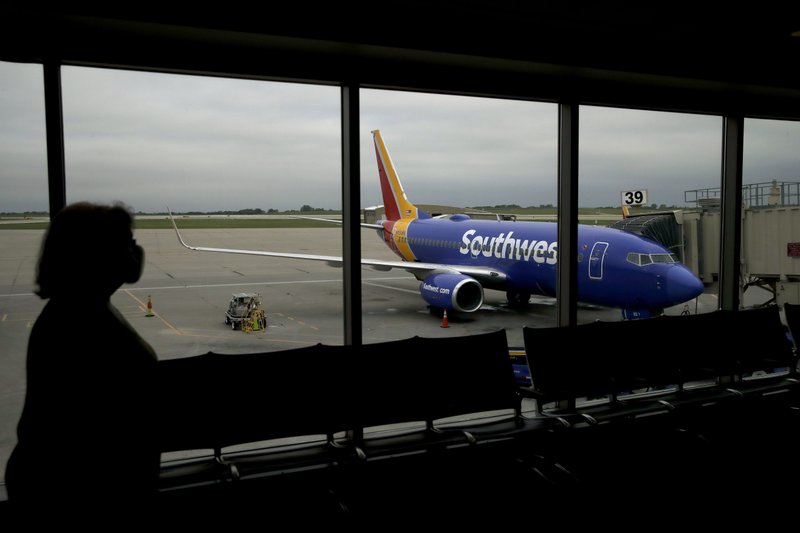 Southwest Airlines has detailed early retirement and extended time off packages as it seeks to avoid layoffs this fall. (AP/Charlie Riedel) 