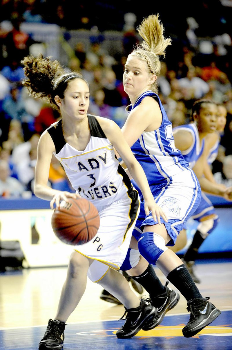 Arkansas Democrat-Gazette/KAREN E. SEGRAVE Prairie Grove's Michelle Lumsargis (No. 3) comes away with the rebound away from Star City's Cassidy Nealy (No. 22) in the class 4A girls state championship held Thursday, March 11, 2010 at the Summit Arena in Hot Springs. Prairie Grove defeated Star City, 59-56, to win the 2010 girls basketball crown. Prairie Grove knocked off West Fork, 54-46, in the 4A North Regional semifinal that year on their way to winning state.