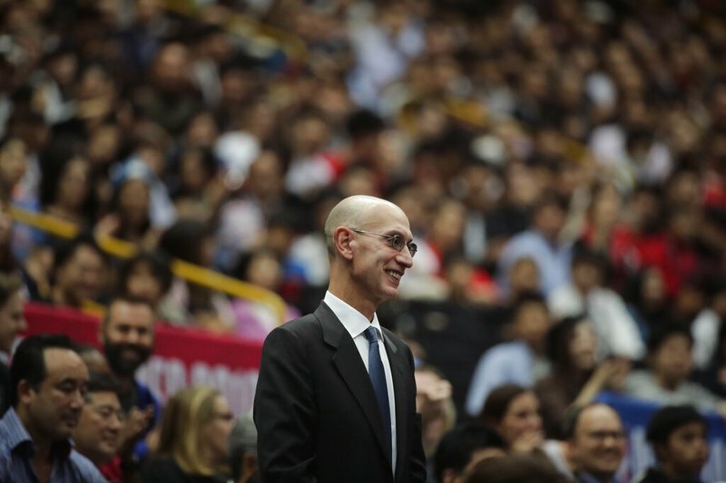 FILE - In this Oct. 8, 2019 file photo, NBA Commissioner Adam Silver is introduced during an NBA preseason basketball game between the Houston Rockets and the Toronto Raptors in Saitama, near Tokyo. Silver said in an interview Saturday, March 21, 2020 that the league is considering all options, best-case, worst-case and countless ideas in between, as it tries to come to grips with the coronavirus pandemic. (AP Photo/Jae C. Hong, File)