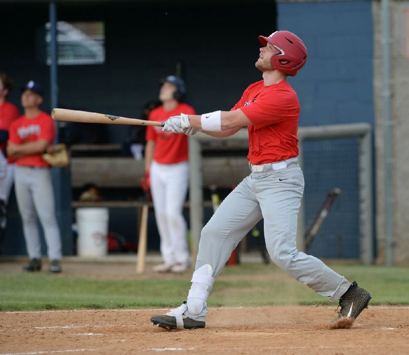 Perfect Timing White third baseman and Arkansas Razorback Cullen Smith watches a ball sail to the outfield Tuesday during play in the Perfect Timing College Baseball League at the Tyson Sports Complex in Springdale. 
(NWA Democrat-Gazette/Andy Shupe) 