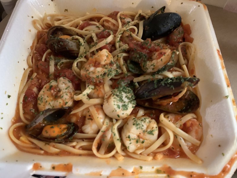 Graffiti's Linguine With Seafood features mussels, scallops and shrimp with fairly firm noodles in a chunky red sauce. 

(Arkansas Democrat-Gazette/Eric E. Harrison)

