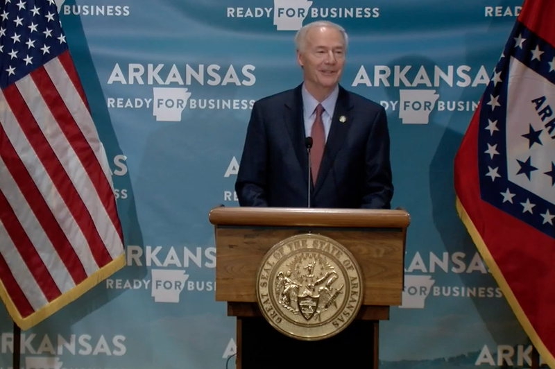 Arkansas Gov. Asa Hutchinson speaks to reporters in Little Rock on Friday in this screen grab of video provided by the governor's office. 