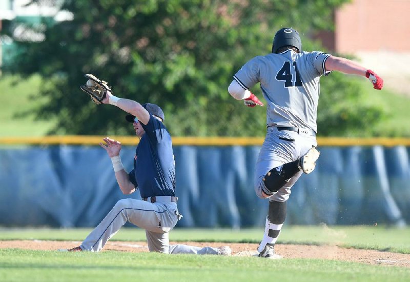 Matt Goodheart makes a play at first base during a Perfect Timing College Baseball League game Thursday at the Tyson Complex in Springdale. Goodheart played with Arkansas this season after injuring his should during the 2019 season.
(NWA Democrat-Gazette/J.T. Wampler)